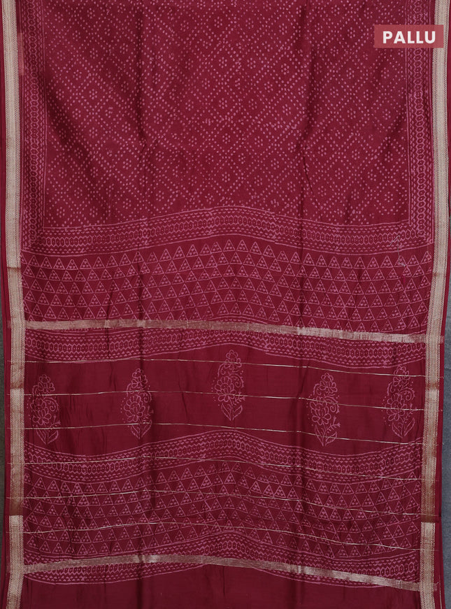 Chanderi bagru saree maroon with allover prints and maheshwari border