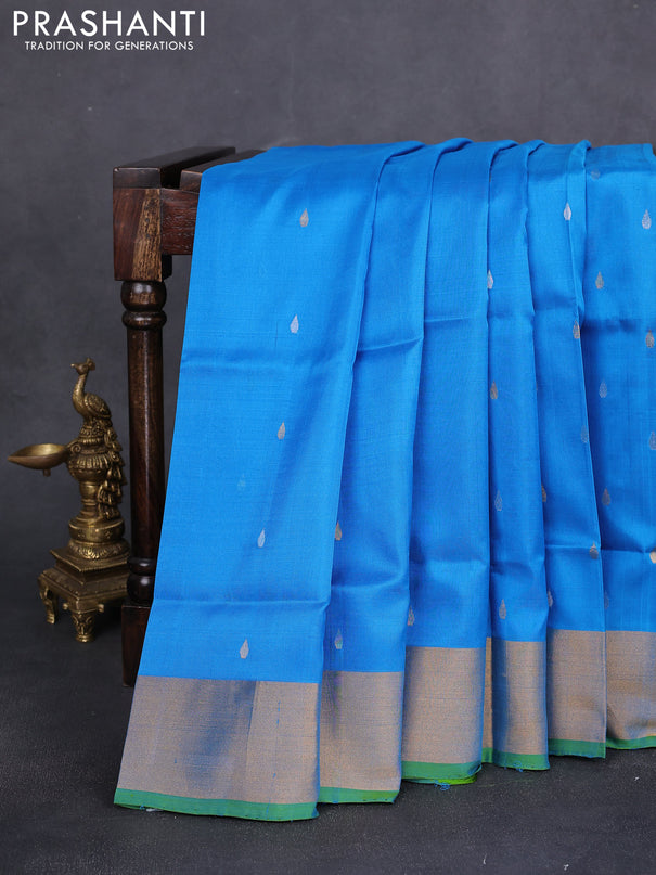 Pure uppada silk saree cs blue and dual shade of greenish blue with silver & gold zari woven tilak buttas and zari woven border