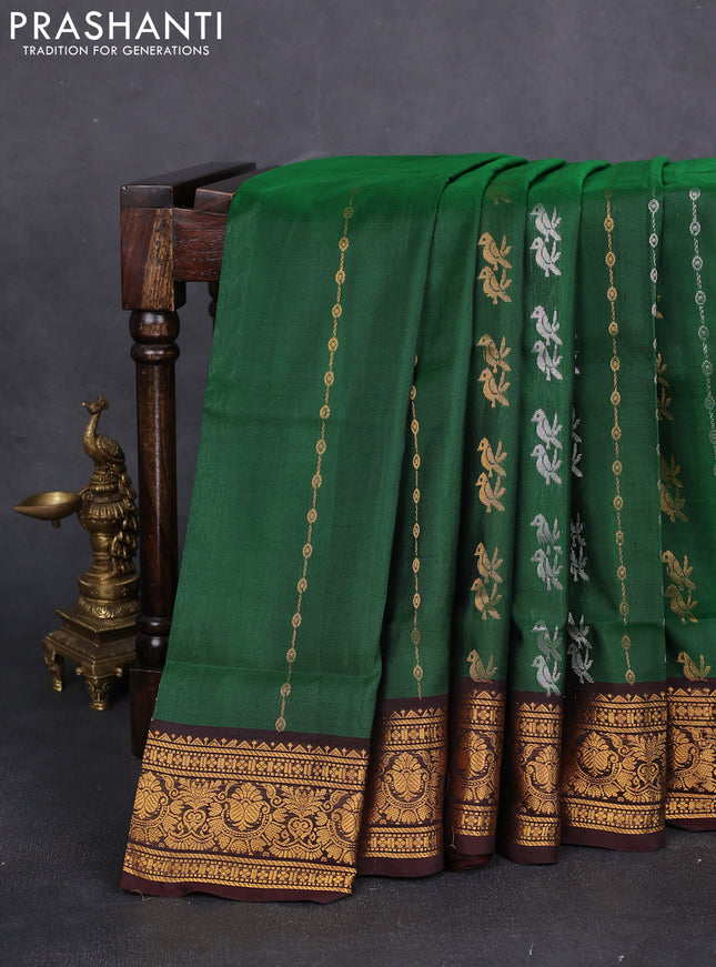 Pure uppada silk saree green and coffee brown with allover silver & gold zari weaves and annam zari woven border