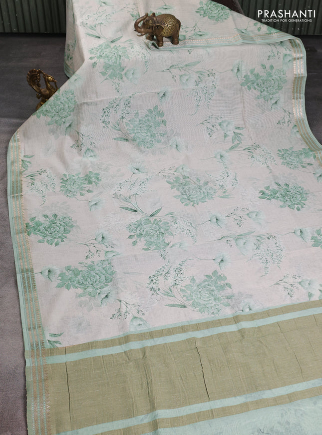 Mul chanderi saree pastel green and off white with allover floral digital prints and zari woven border