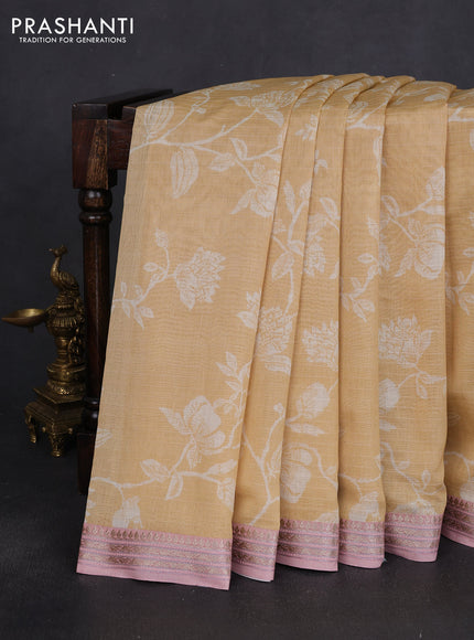 Mul chanderi saree sandal and pastel peach with allover floral digital prints and zari woven border
