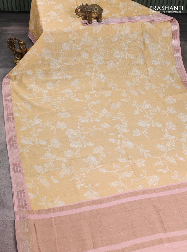 Mul chanderi saree sandal and pastel peach with allover floral digital prints and zari woven border