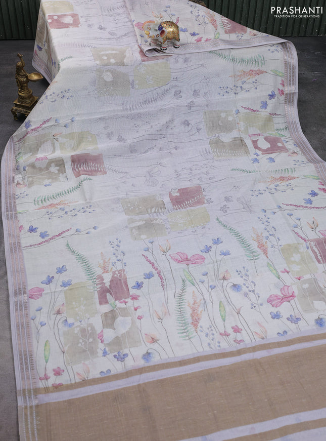 Mul chanderi saree cream and mild lavender with allover floral digital prints and zari woven border