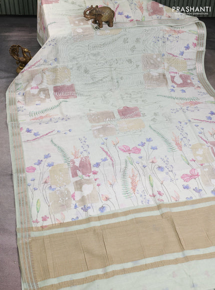 Mul chanderi saree cream and pastel green with allover floral digital prints and zari woven border