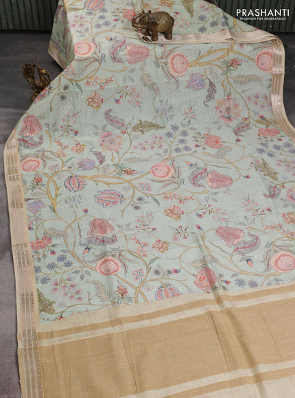 Mul chanderi saree pista green and sandal with allover floral digital prints and zari woven border