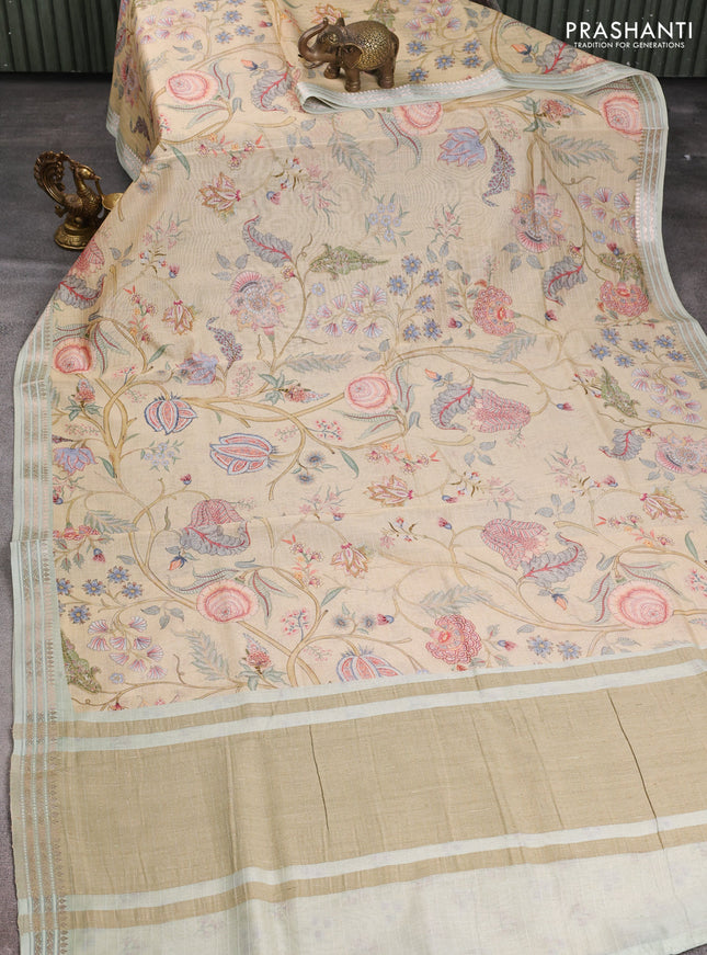 Mul chanderi saree sandal and pastel green with allover floral digital prints and zari woven border