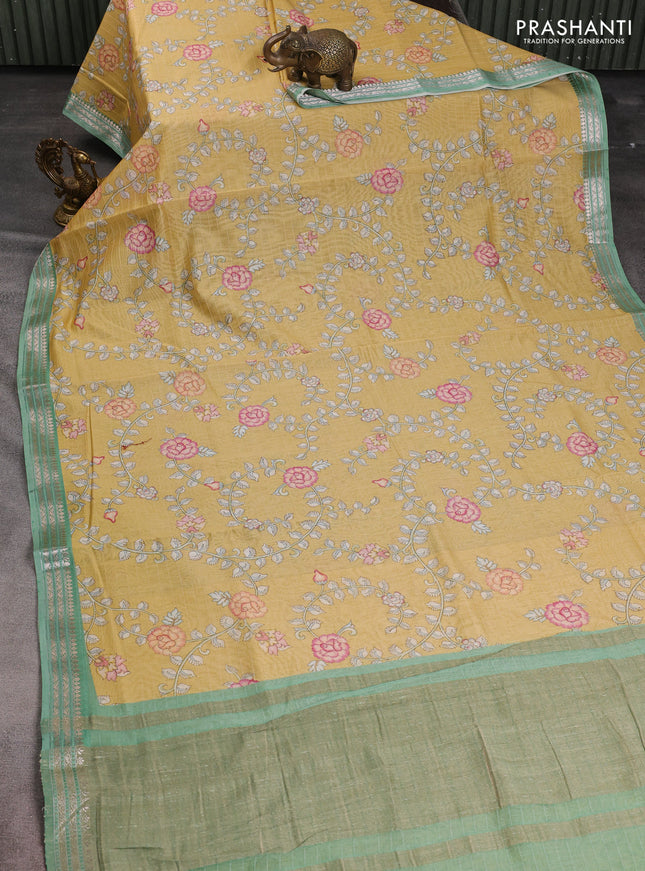 Mul chanderi saree sandal and teal green with allover floral digital prints and zari woven border