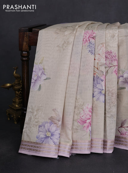 Mul chanderi saree cream and mild lavender with allover floral digital prints and zari woven border