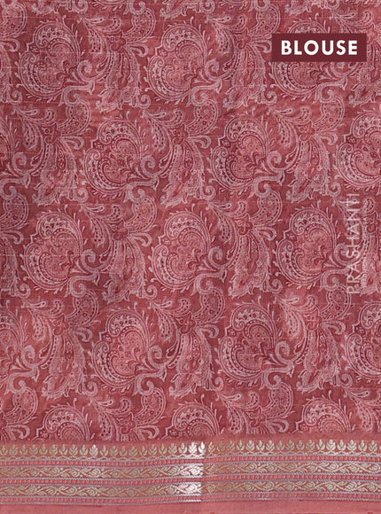 Mul chanderi saree black and pastel peach with allover digital prints and zari woven border