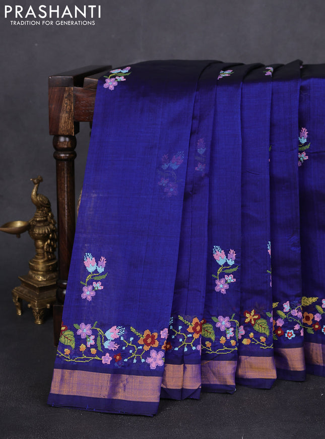 Silk cotton saree blue with floral embriodery and zari woven border