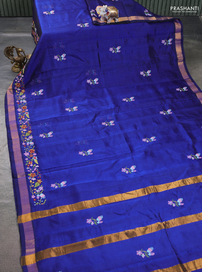 Silk cotton saree blue with floral embriodery and zari woven border