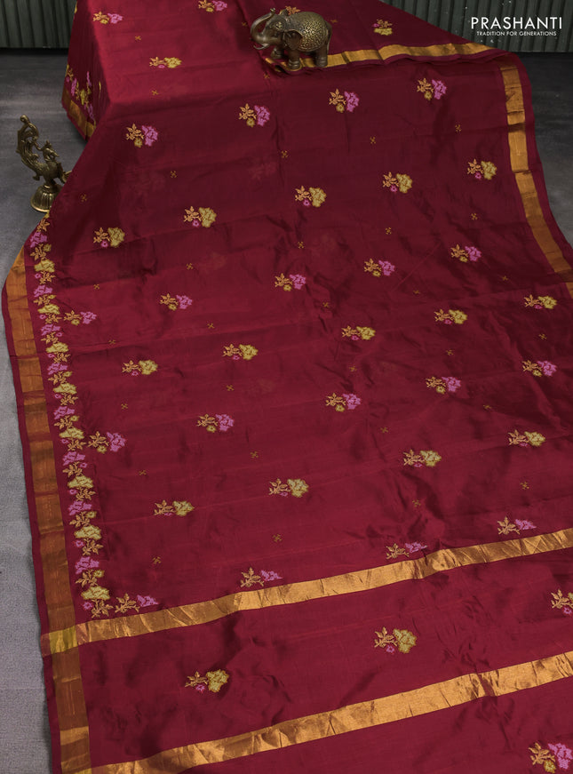 Silk cotton saree maroon with floral embriodery and zari woven border