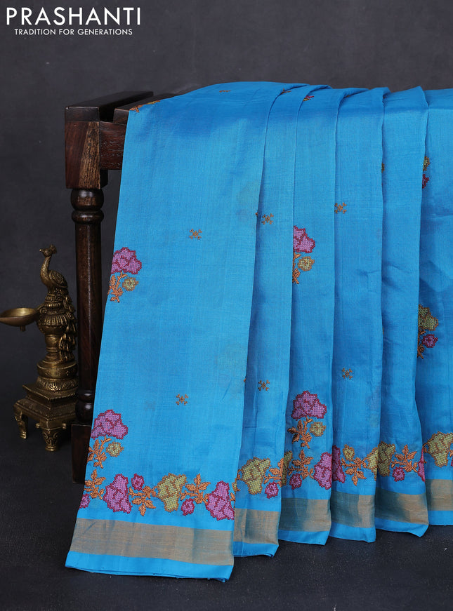 Silk cotton saree cs blue with floral embriodery and zari woven border