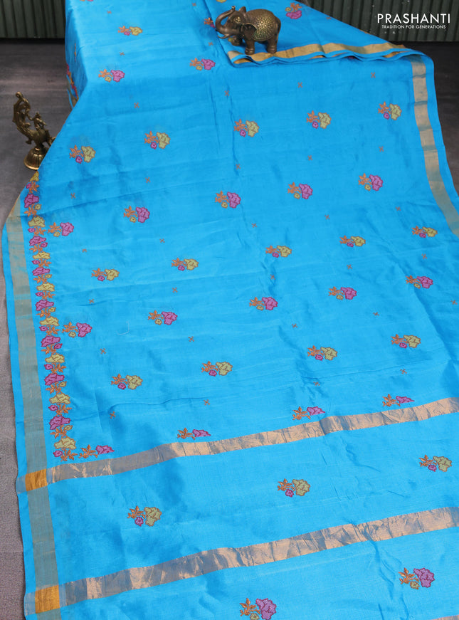 Silk cotton saree cs blue with floral embriodery and zari woven border