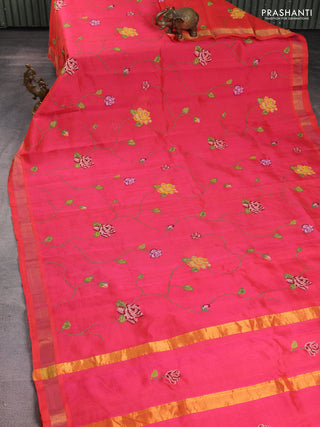 Silk cotton saree pinkish orange with allover floral embriodery and zari woven border