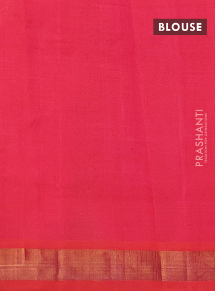 Silk cotton saree pinkish orange with allover floral embriodery and zari woven border