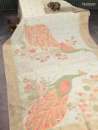 Semi raw silk saree cream and allover jamdhani weaves and zari woven border