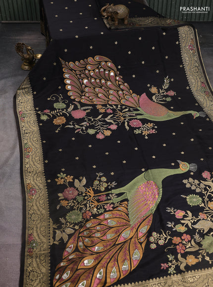 Semi raw silk saree black and allover jamdhani weaves and zari woven border