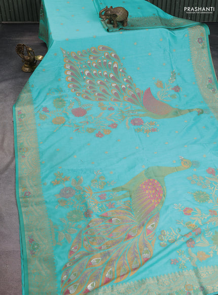 Semi raw silk saree teal blue and allover jamdhani weaves and zari woven border