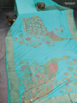Semi raw silk saree teal blue and allover jamdhani weaves and zari woven border