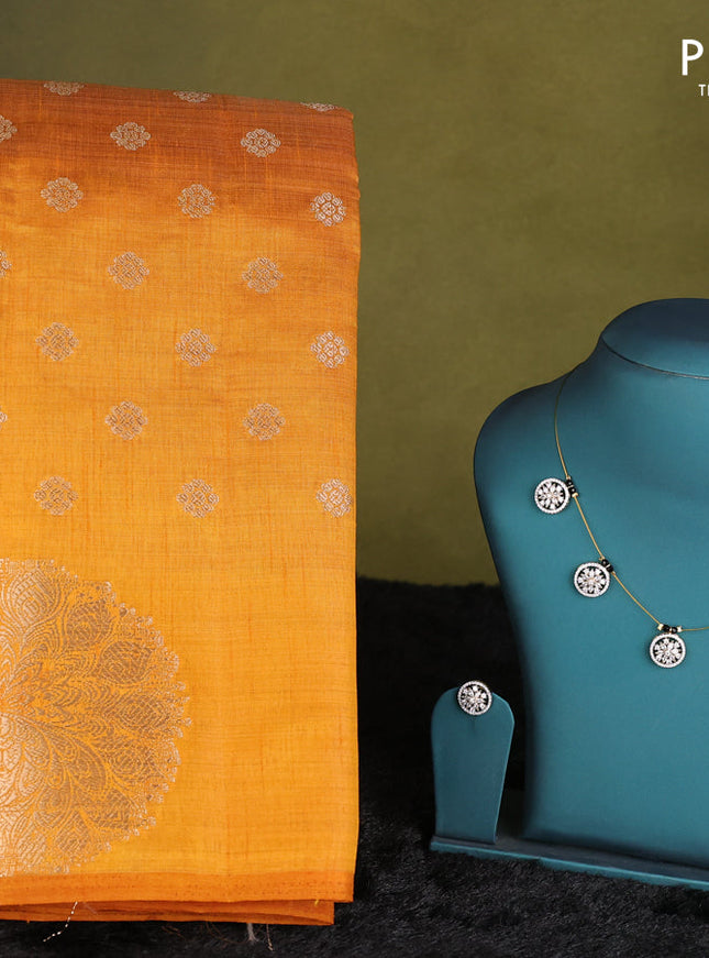 Mustard yellow raw silk saree with matching Neck piece