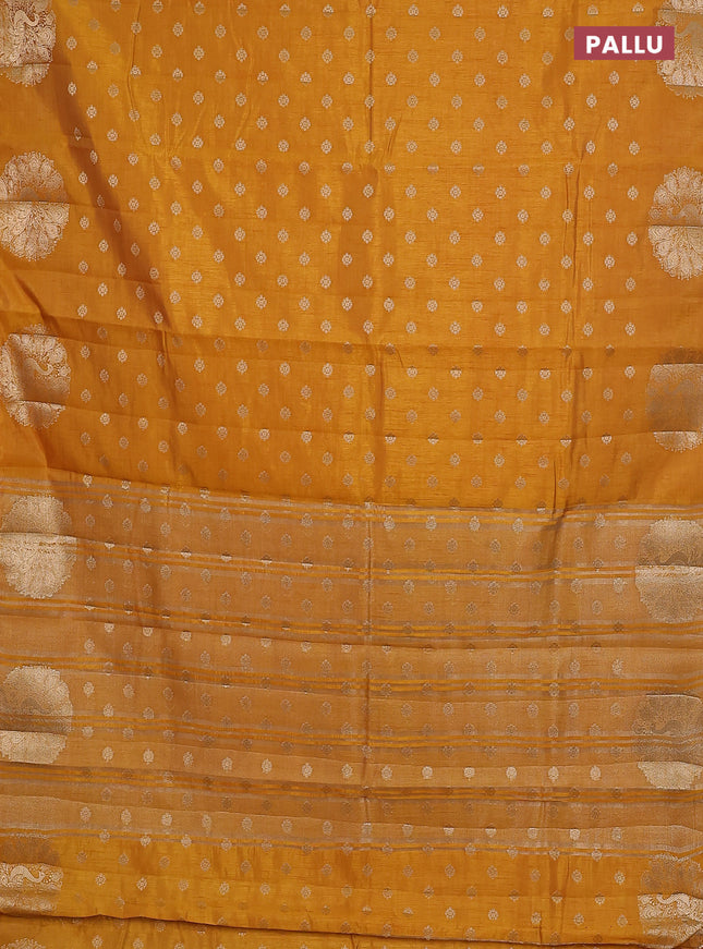 Mustard yellow raw silk saree with matching Neck piece