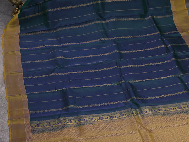 Dual shade of green-Mehendi green kanchipuram silk saree with matching neck piece