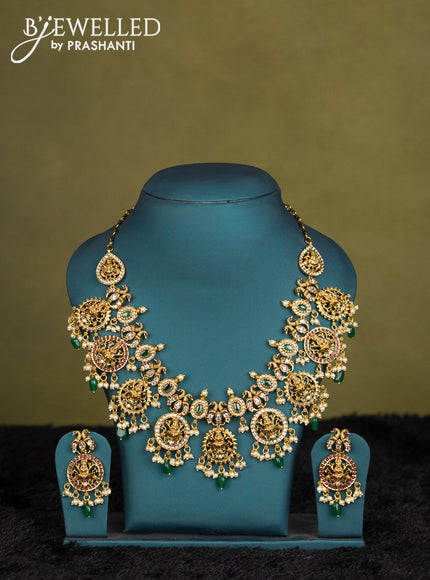 Dual shade of green-Mehendi green kanchipuram silk saree with matching neck piece