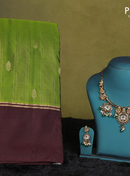 Green-Coffee brown kanchipuram silk saree with matching antique necklace