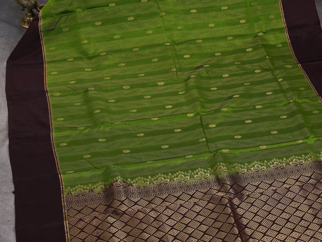 Green-Coffee brown kanchipuram silk saree with matching antique necklace