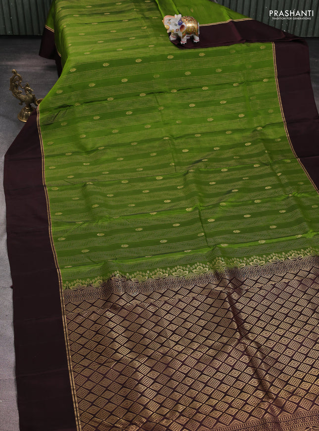 Green-Coffee brown kanchipuram silk saree with matching antique necklace
