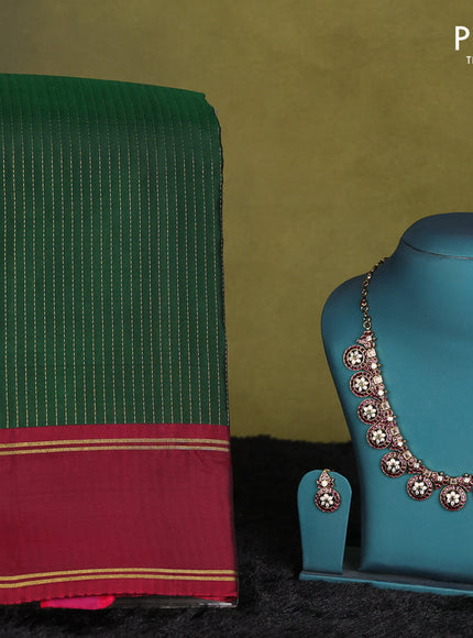 Green-Maroon kanchipuram silk saree with matching antique necklace