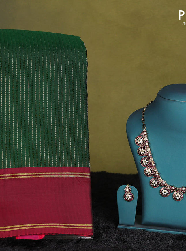 Green-Maroon kanchipuram silk saree with matching antique necklace