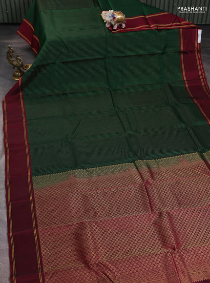 Green-Maroon kanchipuram silk saree with matching antique necklace