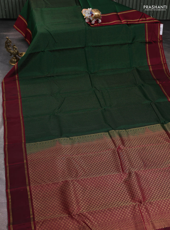 Green-Maroon kanchipuram silk saree with matching antique necklace