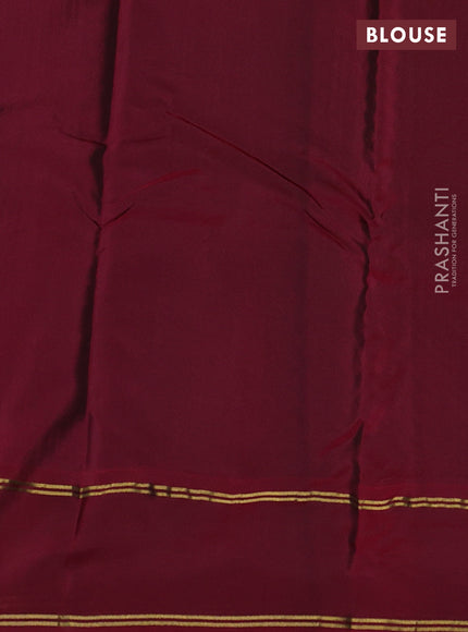 Green-Maroon kanchipuram silk saree with matching antique necklace
