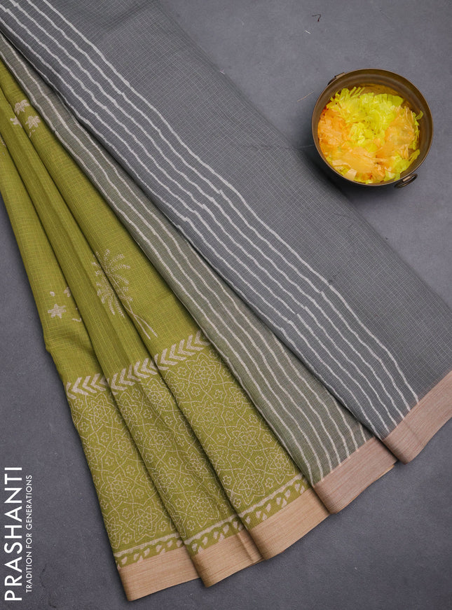 Kota silk cotton saree light green and grey with block prints and long printed border