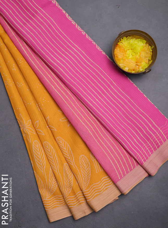 Kota silk cotton saree mustard yellow and pink with allover block prints and simple border