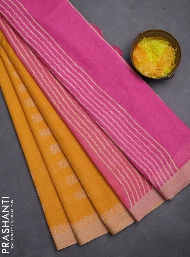Kota silk cotton saree mustard yellow and pink with allover block prints and simple border