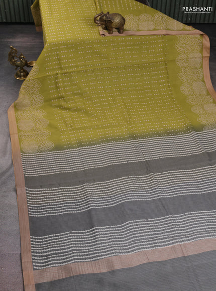 Kota silk cotton saree light green and grey with allover block prints and printed border