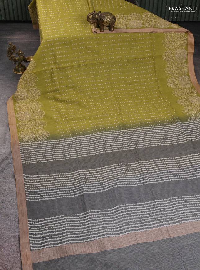 Kota silk cotton saree light green and grey with allover block prints and printed border