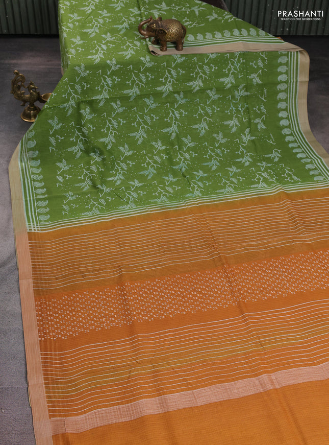 Kota silk cotton saree light green and dark mustard with allover block prints and simple border