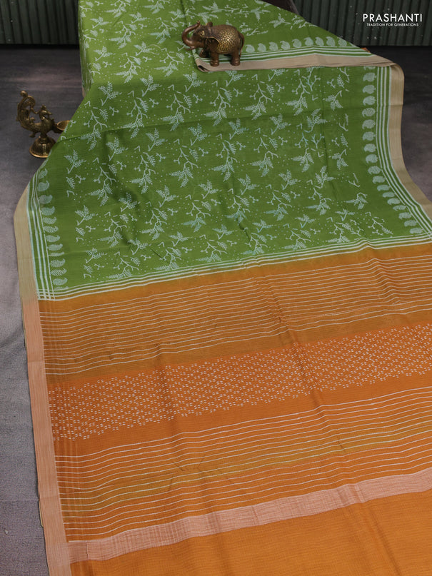 Kota silk cotton saree light green and dark mustard with allover block prints and simple border