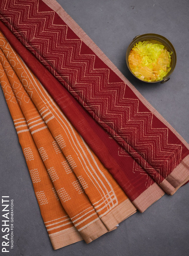 Kota silk cotton saree orange and red with allover block prints and simple border