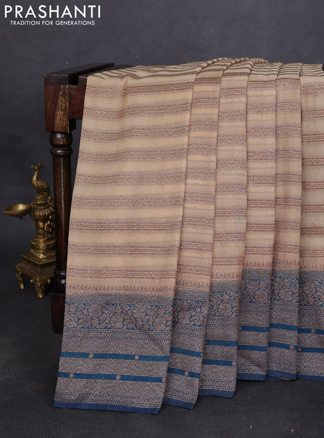 Banarasi semi crepe saree beige and peacock green with allover zari weaves and long zari woven border