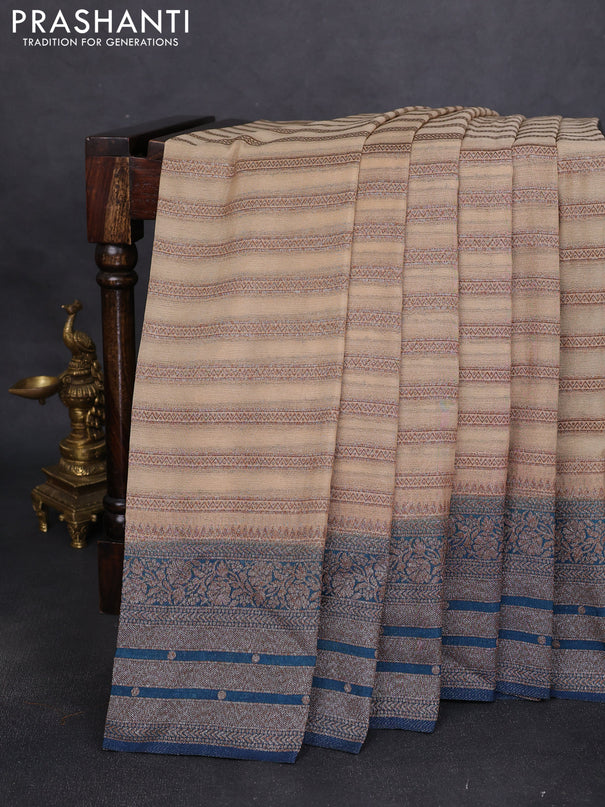 Banarasi semi crepe saree beige and peacock green with allover zari weaves and long zari woven border