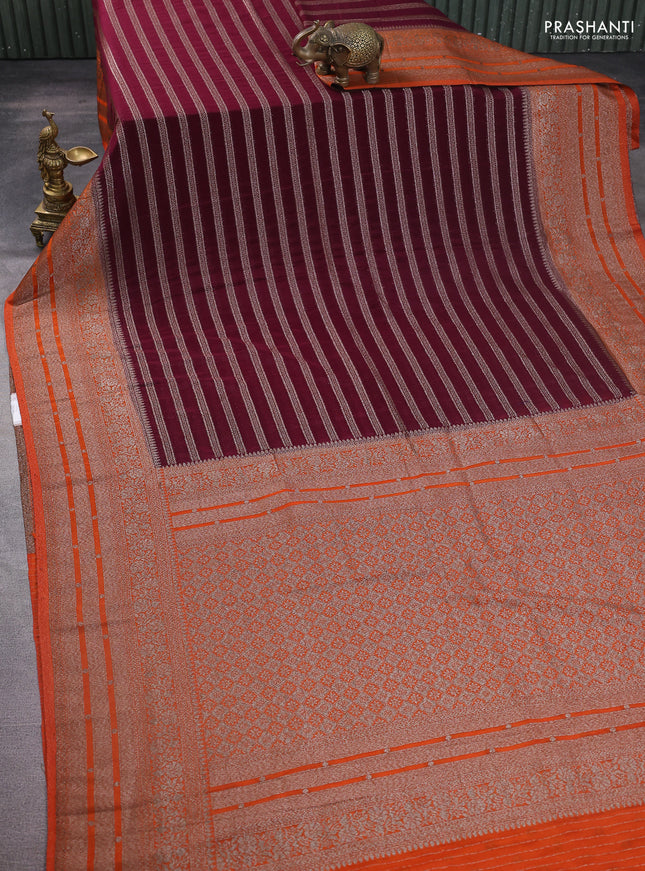 Banarasi semi crepe saree wine shade and orange with allover zari weaves and long zari woven border