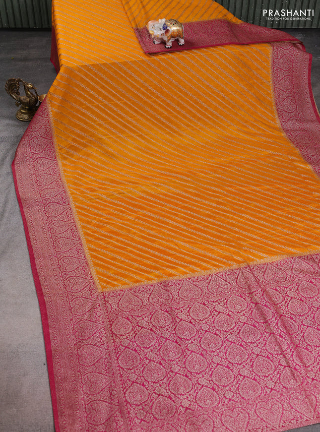 Banarasi semi crepe saree yellow and purple with allover zari weaves and zari woven border