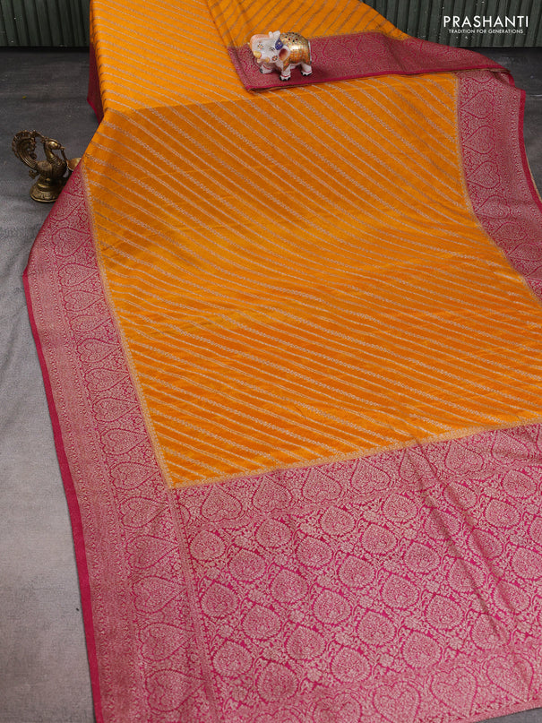 Banarasi semi crepe saree yellow and purple with allover zari weaves and zari woven border