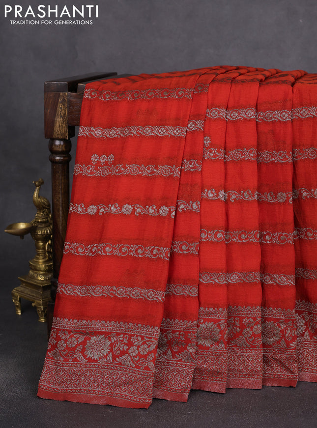 Banarasi semi crepe saree orange with allover thread & zari weaves and zari woven border